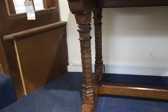 Attributed to A. W. N. Pugin (1812-52). A mid 19th century Reformed Gothic oak writing table, supplied by John Webb and possibly made b